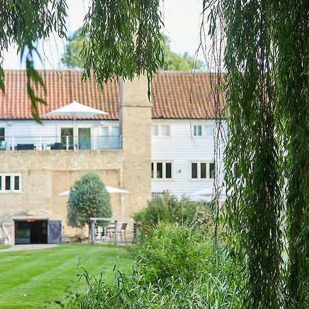 Tuddenham Mill Luxury Hotel Exterior photo The former stable block