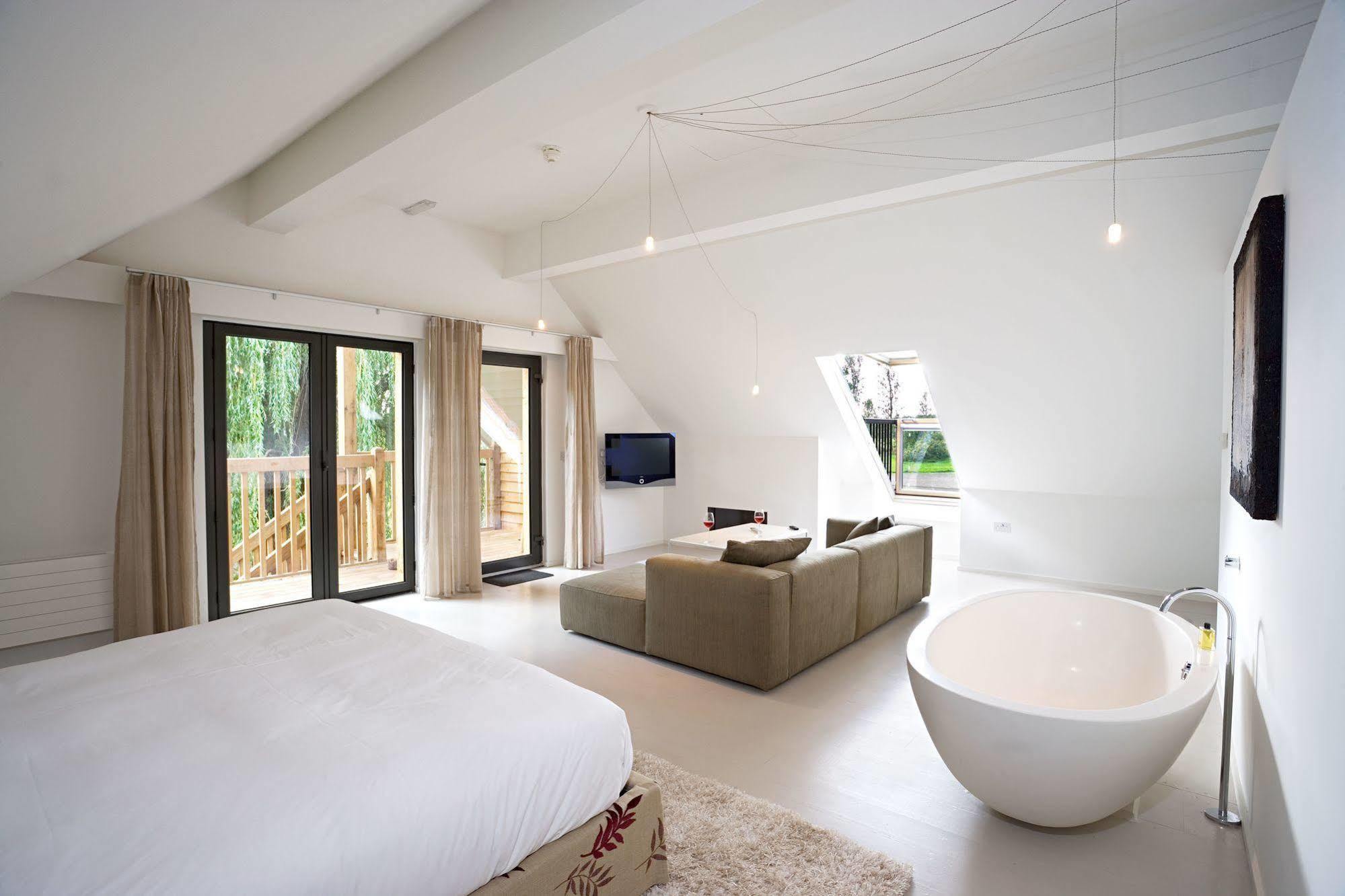 Tuddenham Mill Luxury Hotel Exterior photo The interior of a suite at The Old Course Hotel, St Andrews