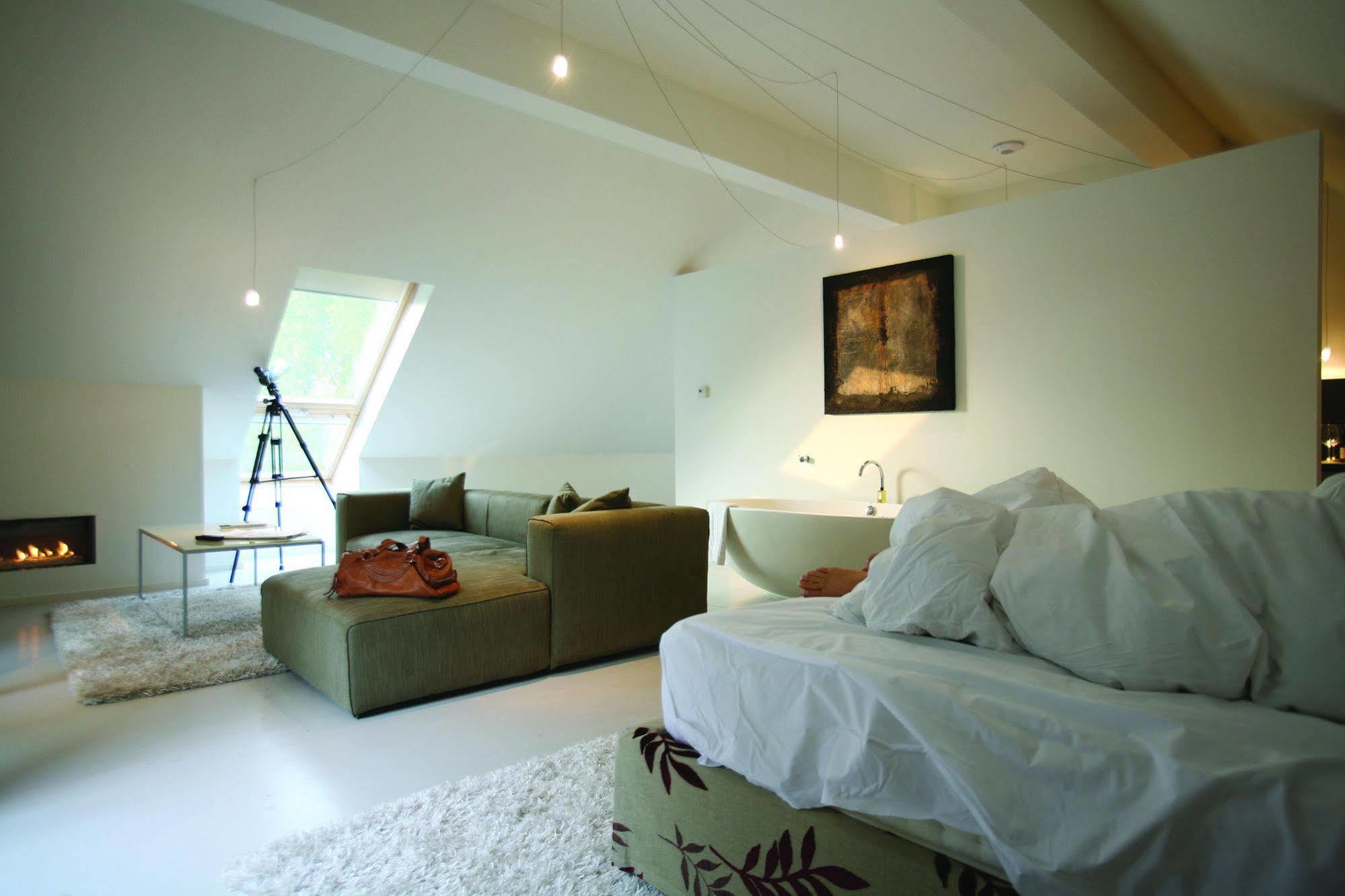 Tuddenham Mill Luxury Hotel Exterior photo The interior of a room at the hotel