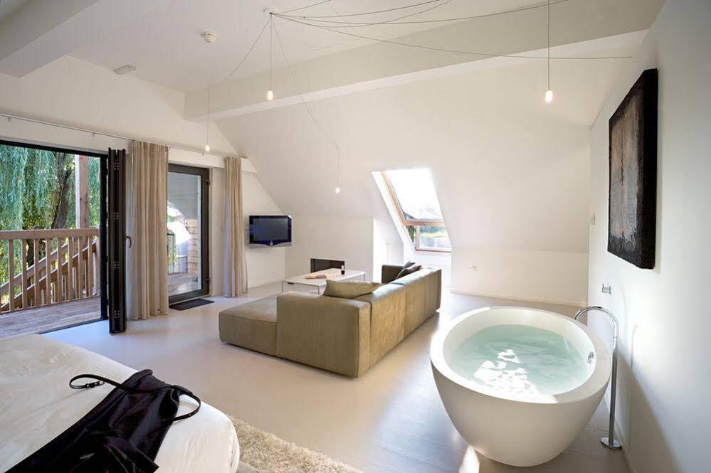 Tuddenham Mill Luxury Hotel Exterior photo A suite at the Hotel